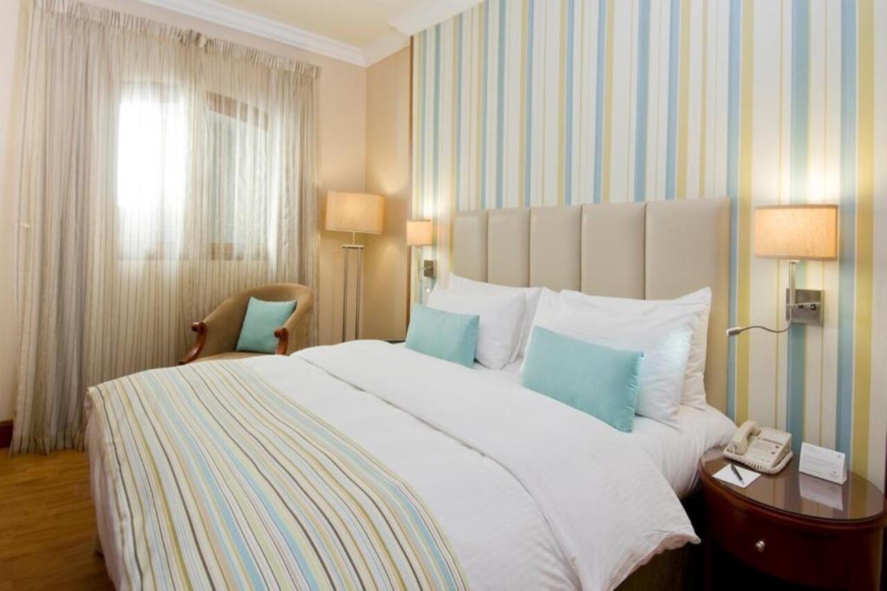 Danat Al Ain Resort Extérieur photo A bedroom